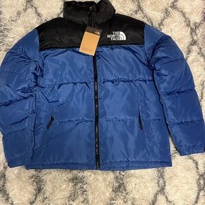 Blue North Face Puffer Jacket
